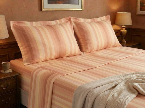 Havana Stripe Peach bedding set on fully made bed – 400TC cotton bedsheet by Snoozy Panda